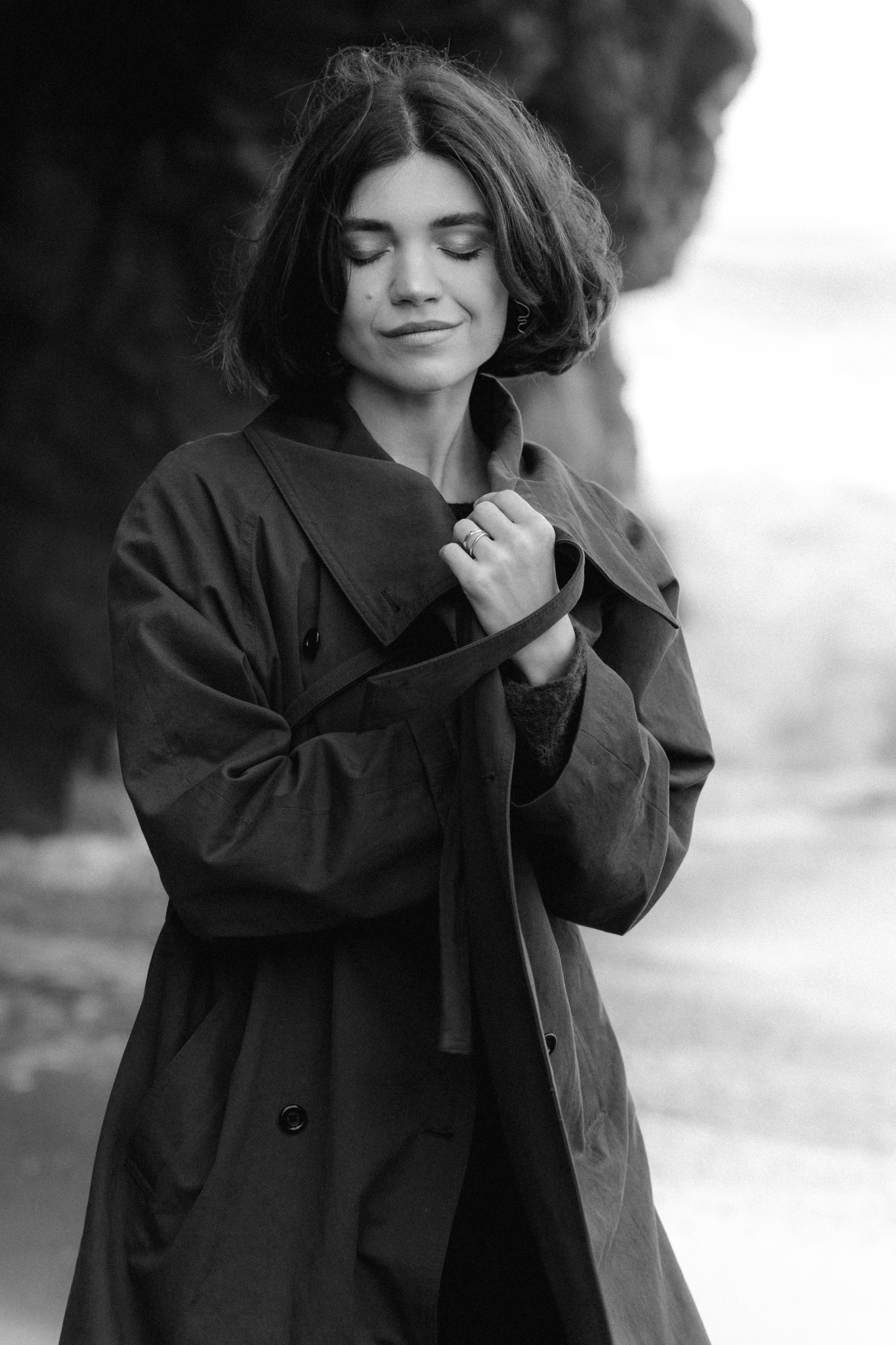 Black-and-white portrait by the sea