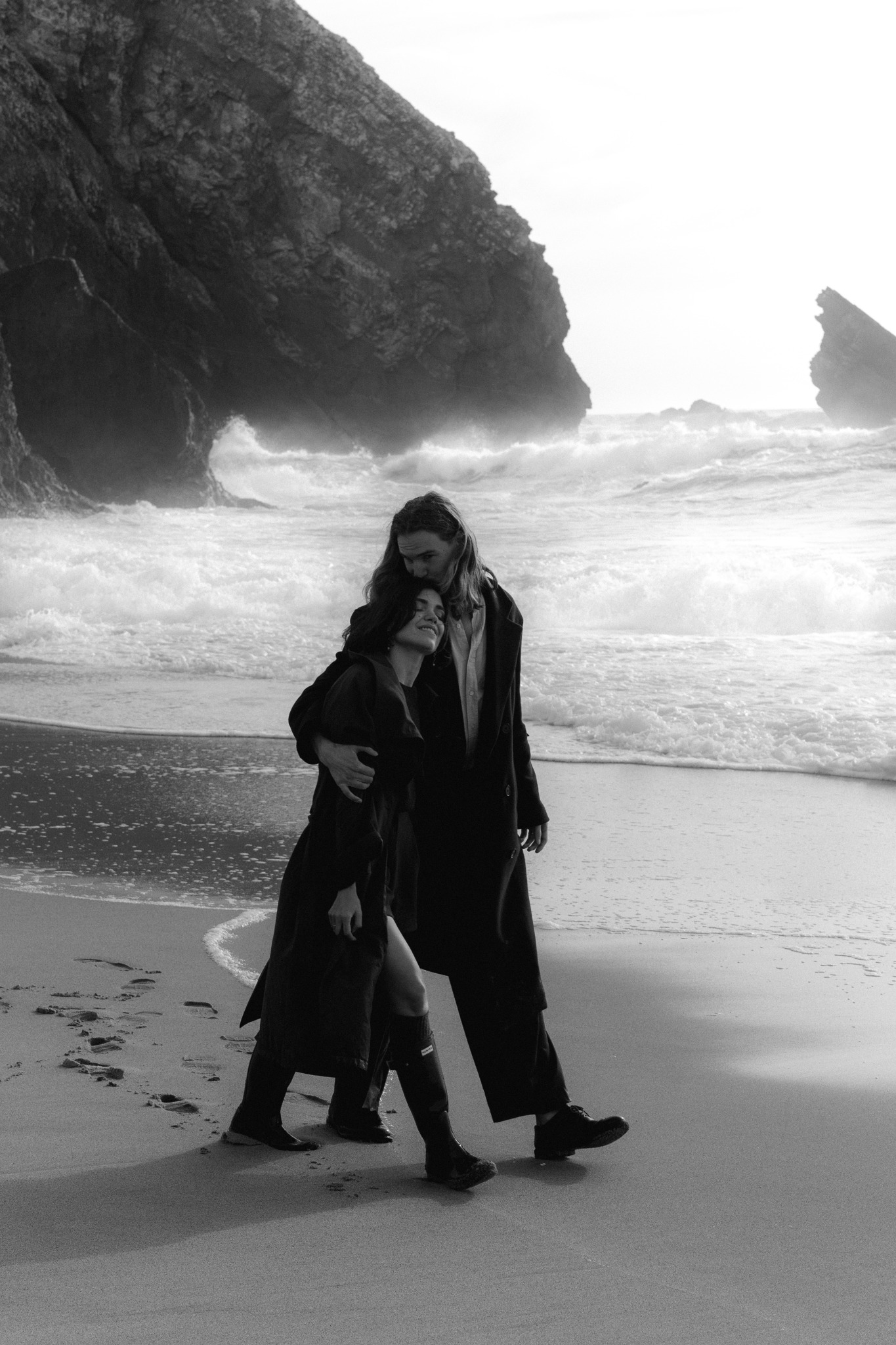 Couple embracing on a wild Atlantic beach